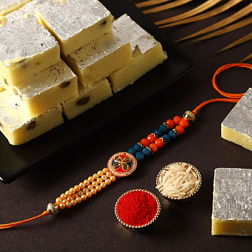 Sneh Designer Beads Rakhi & Pista Burfi:Rakhi and Sweets to USA