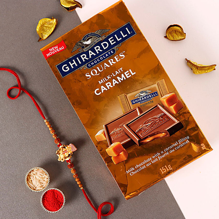 Sneh Gold Ganesha Rakhi & Milk Caramel Chocolates:Devotional Rakhi to USA