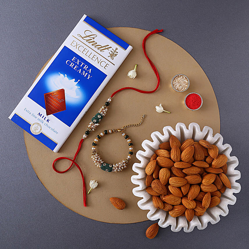Sneh Pearl Rakhi Set With Lindt Chocolates & Almonds:Rakhi With Chocolates to USA