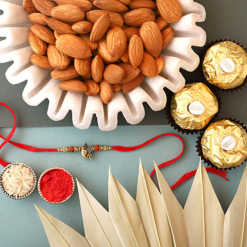 Ganesha Blessings Designer Rakhi With Almonds & Ferrero Rocher:Rakhi and Chocolates USA