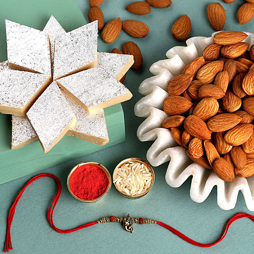Ganesha Blessings Designer Rakhi With Kaju Katli & Almonds:Rakhi with Dry Fruits to USA