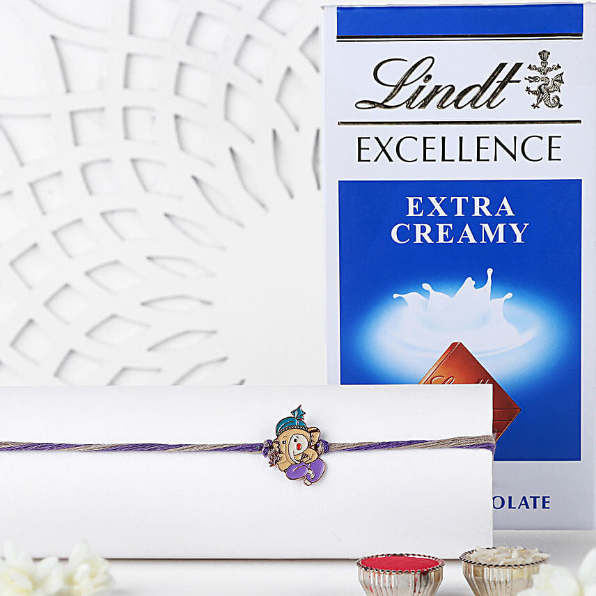 Bal Ganesha Charm Rakhi N Lindt Milk Chocolate