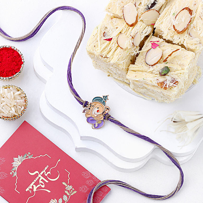Bal Ganesha Cheerful Charm Rakhi N Soan Papdi Bliss