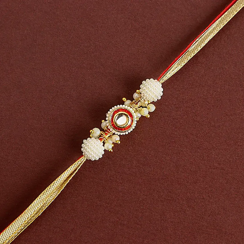 Crimson Majestic Pearl Rakhi N Besan Laddoo Delight
