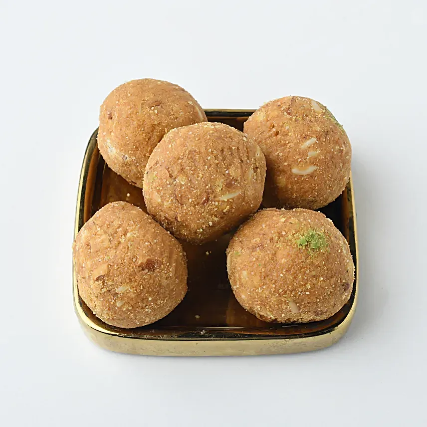 Crimson Majestic Pearl Rakhi N Besan Laddoo Delight