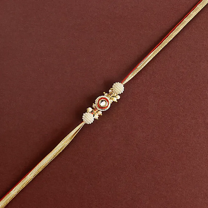 Crimson Majestic Pearl Rakhi N Besan Laddoo Delight