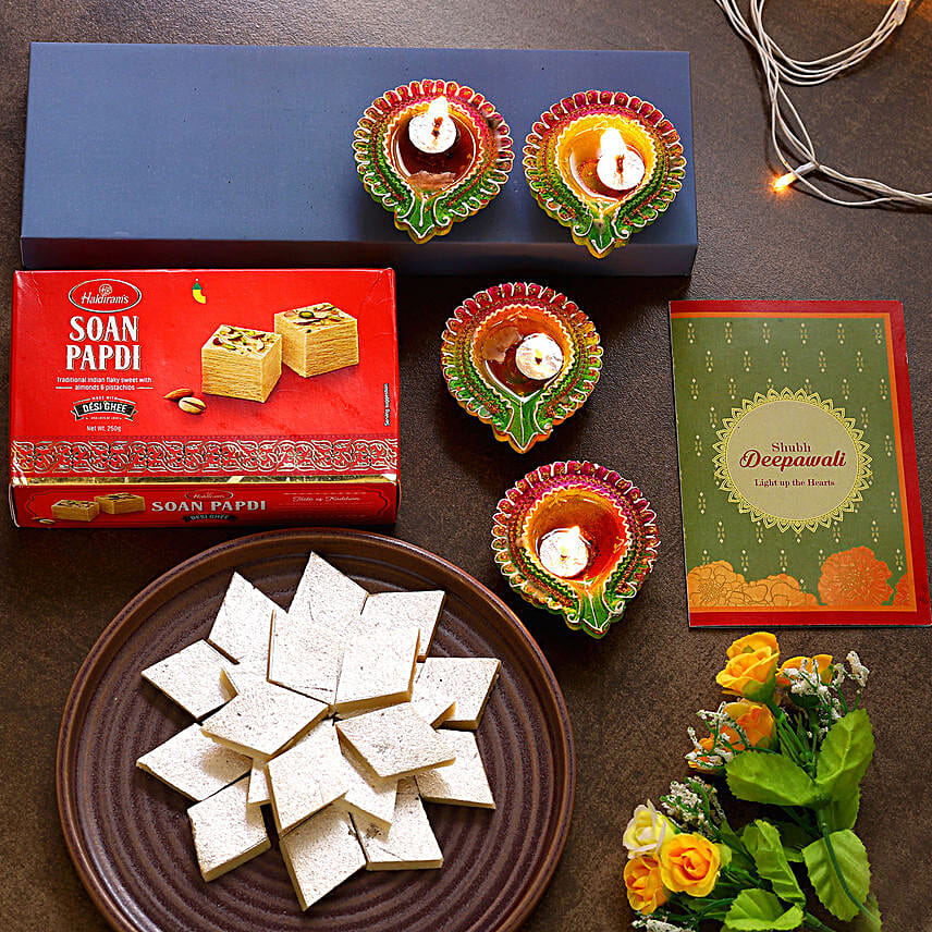Diwali Special Floral Diyas And Sweets Hamper