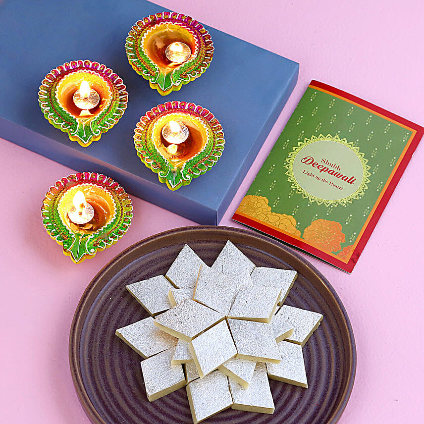 Floral Diyas With Greeting Card And Kaju Katli