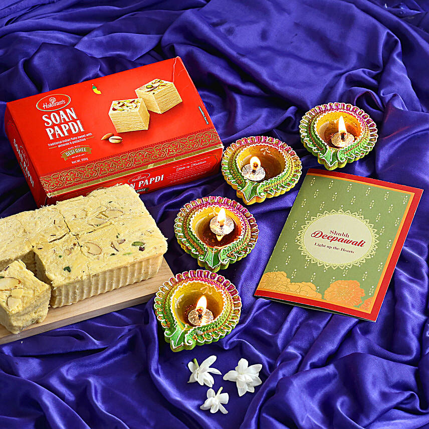 Floral Diyas With Greeting Card And Soan Papdi