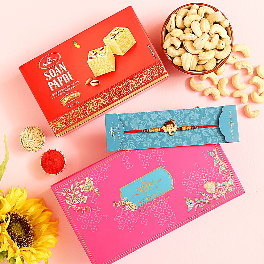 Ganesha Face Kids Rakhi And Cashew With Soan Papdi