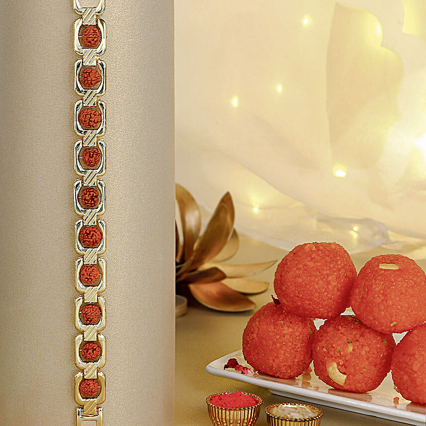 Glamorous Gold Embellished Rudraksh Rakhi N Laddoo Combo