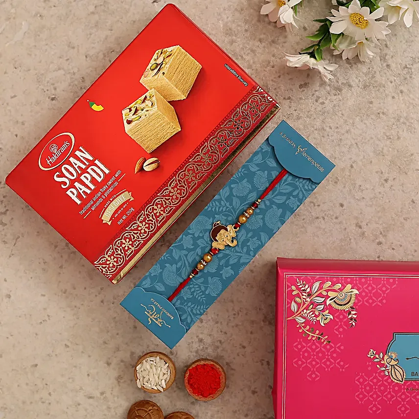 Long Trunk Bal Ganesha Kids Rakhi And Soan Papdi