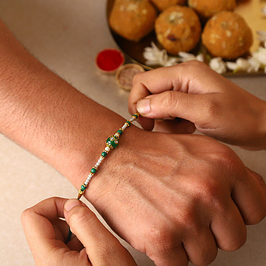 Sneh Fancy Green Rakhi & Almonds