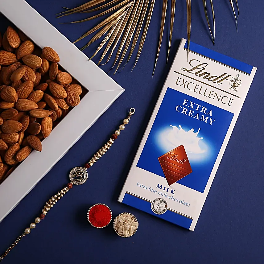 Sneh Om Pearl Rakhi With Lindt Chocolates & Almonds