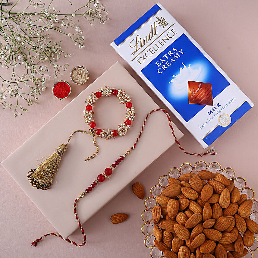 Sneh Red Rakhi Set With Lindt Chocolates & Almonds