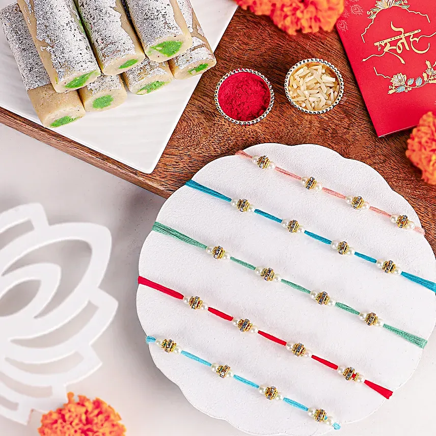 Understated Elegance Beads Rakhi Set N Kaju Roll Delight