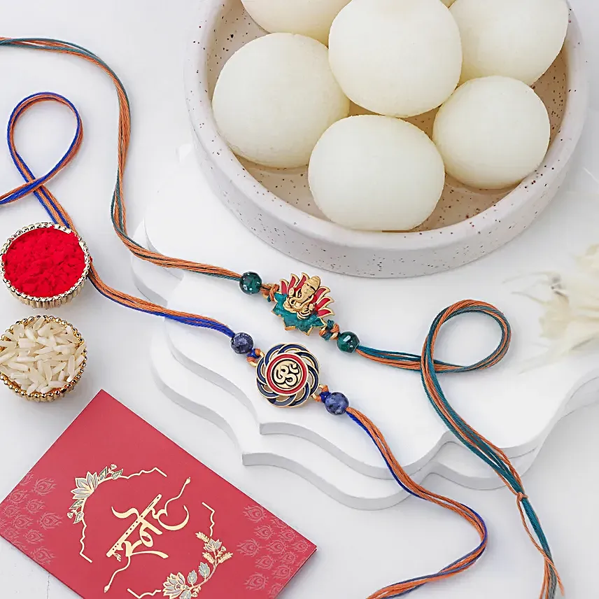 Vibrant Ganesh and Om Rakhi Duo N Rasgulla Delight