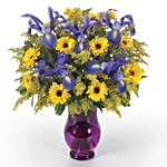 Serene Assorted Flowers Purple Vase Arrangement