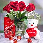Ravishing Red Roses Bouquet With Teddy And Lindt