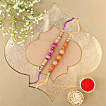 Sneh Peachy Rakhi Set With Almonds & Ferrero Rocher