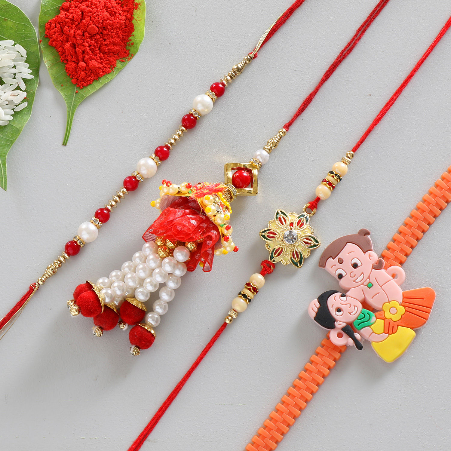 Buy/Send Set of 4 Classy & Cartoon Rakhis Online- FNP Buy/Send Set of 4 Classy & Cartoon Rakhis Online- FNP
