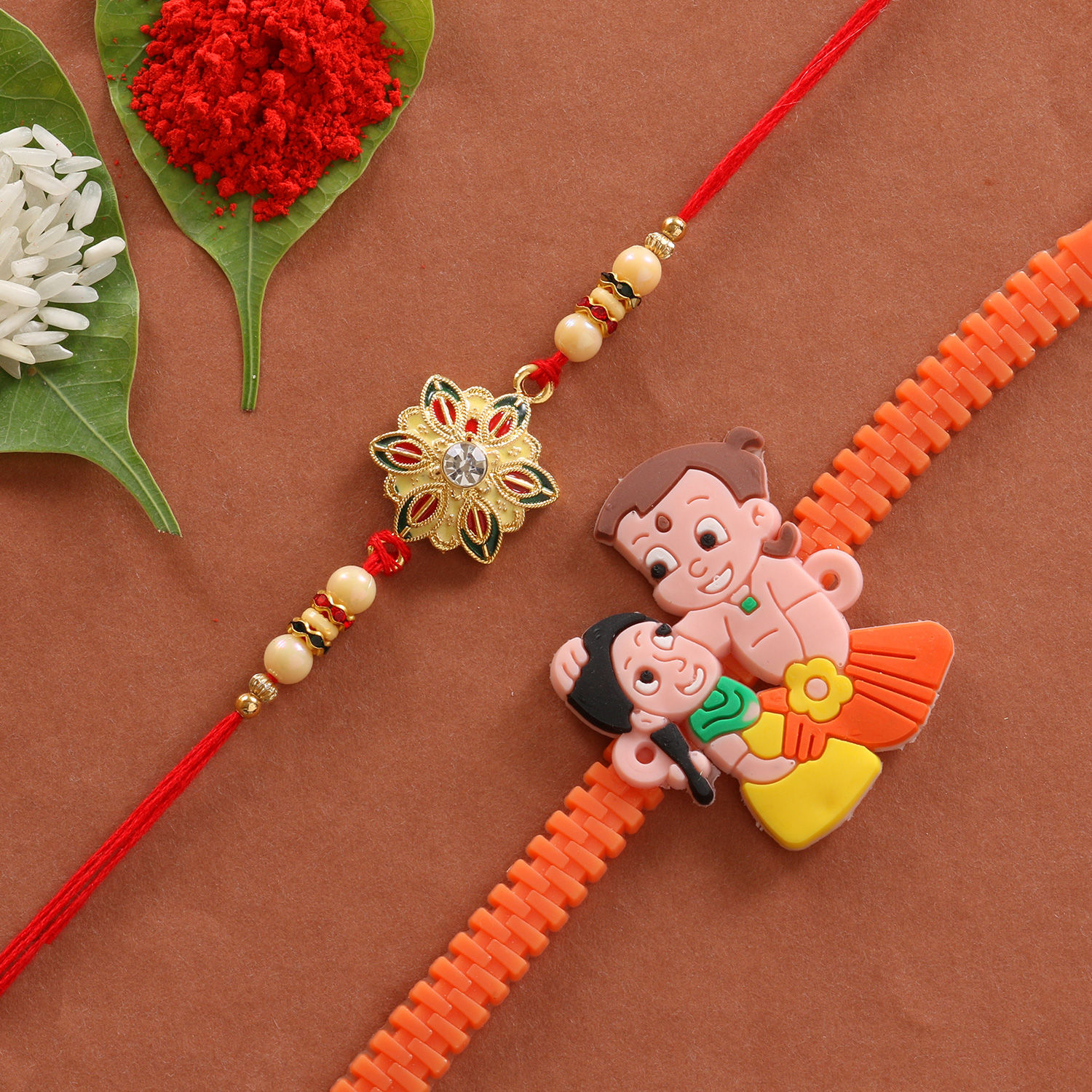 Buy/Send Combo of Cartoon & Floral Designer Rakhi Online- FNP Buy/Send Combo of Cartoon & Floral Designer Rakhi Online- FNP