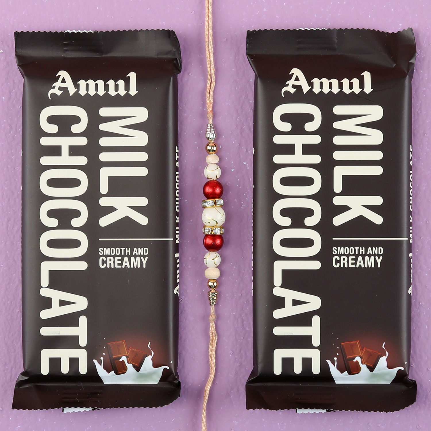 Buy/Send Pearl Rakhi & Amul Milk Chocolate Bars Online- FNP