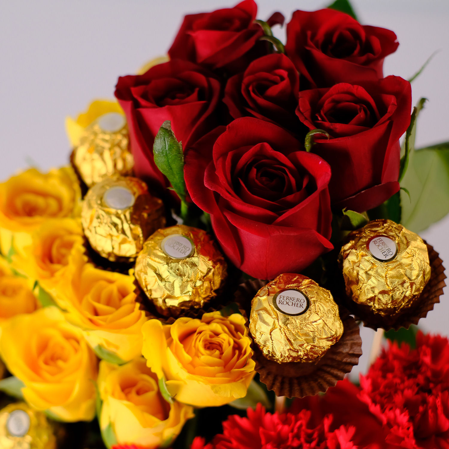 Buy/Send Mixed Flowers & Ferrero Rocher Arrangement Online- FNP