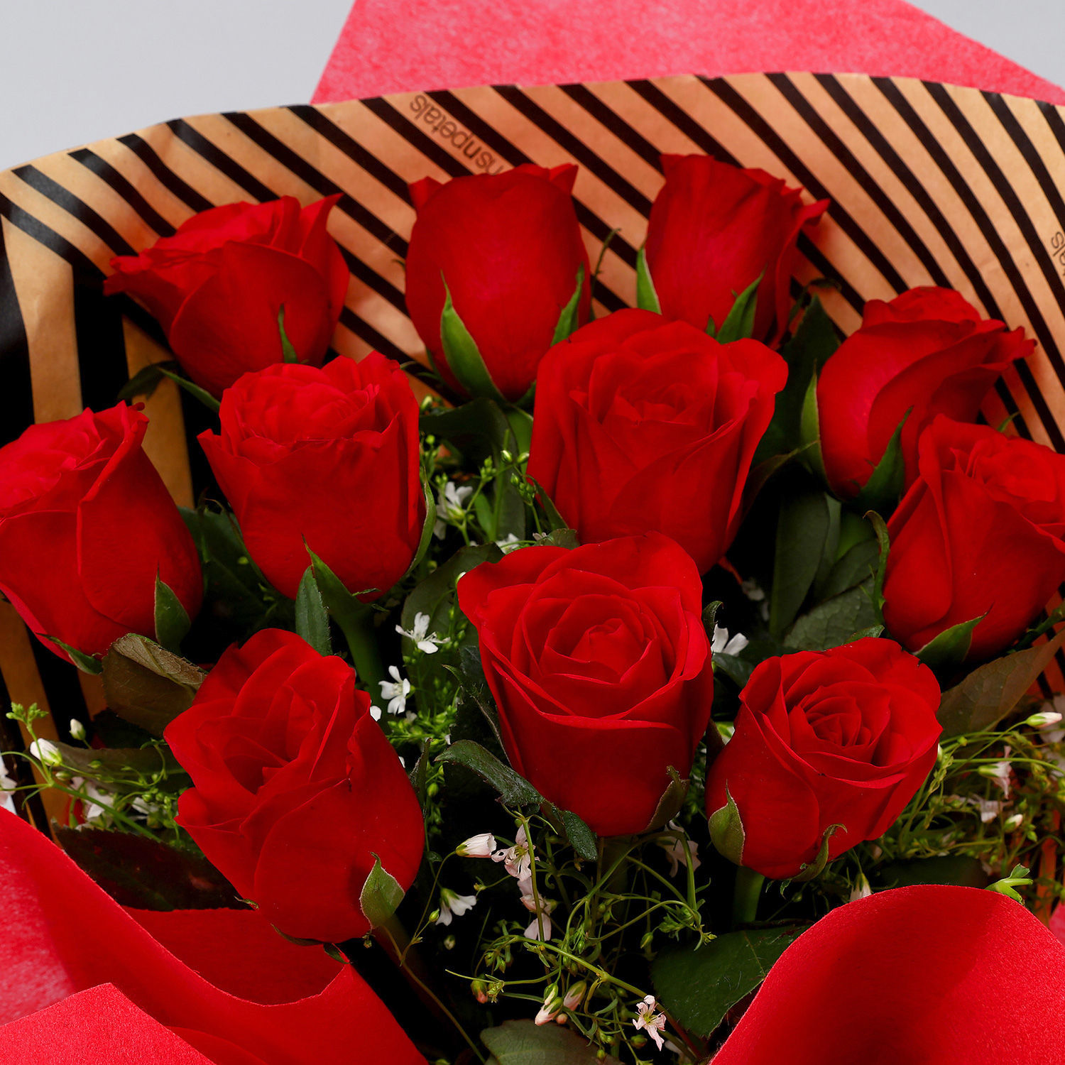 Buy/Send Romantic 10 Red Roses Bouquet Online- FNP