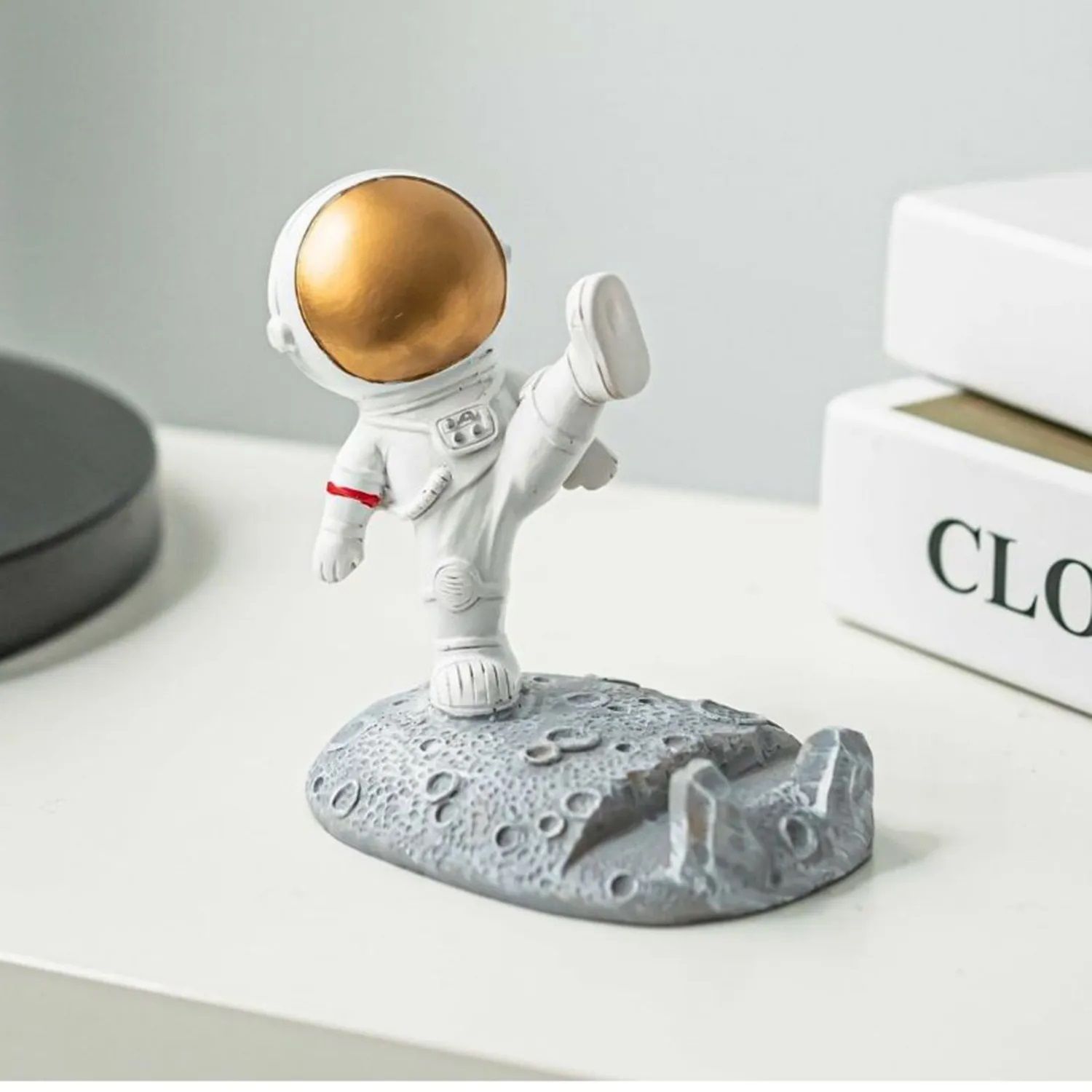 Buy/Send Kicking Astronaut Mobile Phone Holder Online- FNP