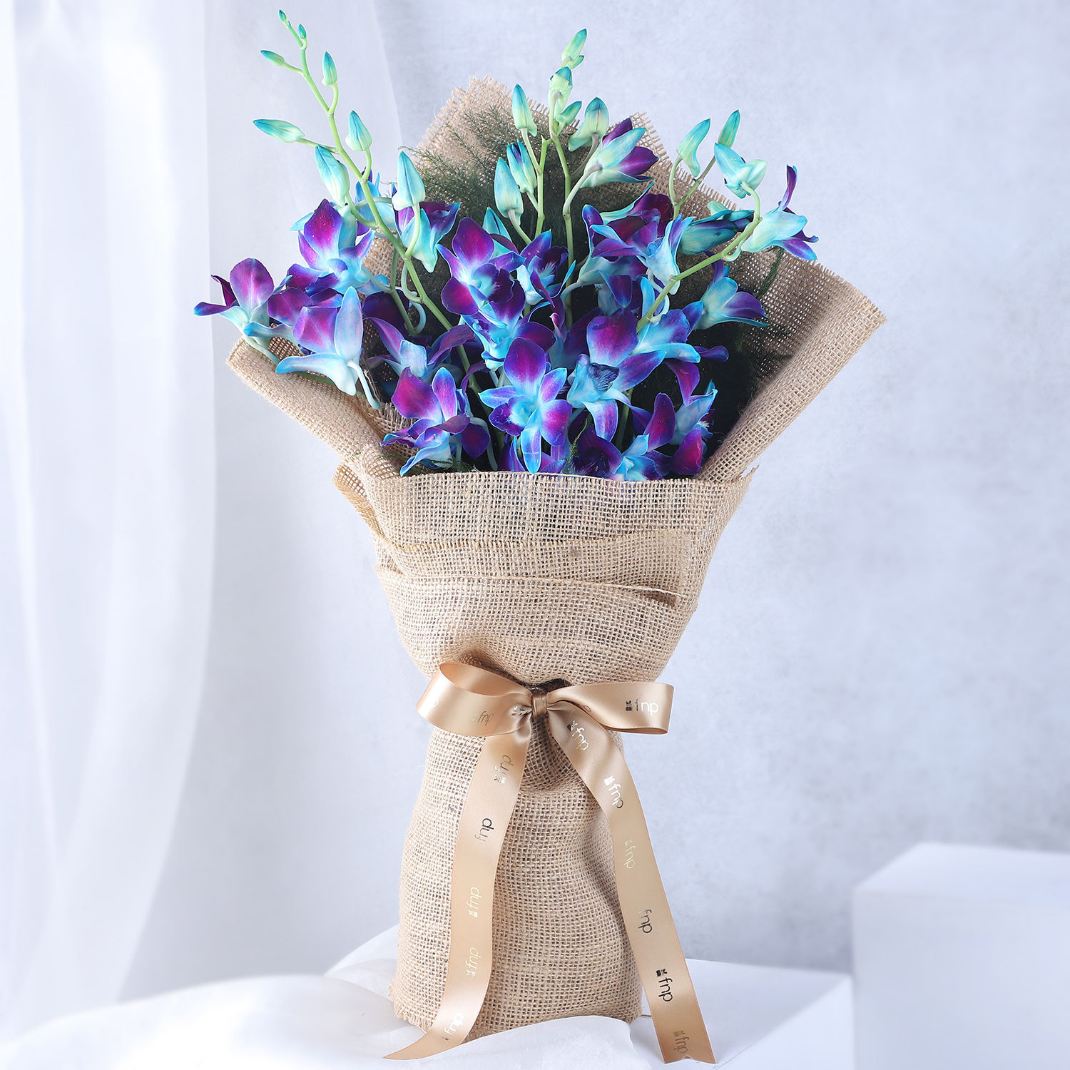 Buy/Send Enchanted Blue Orchid Bouquets Online- FNP